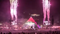 Glastonbury’s ‘mystery’ performer ‘gives away’ appearance as he flies into UK