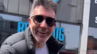 Fans spot 'lost' Simon Cowell cycling around London - then quiz him on safety