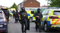 Four injured after three dogs escaped and mauled 'several people' in attack