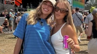 Zara McDermott cuddles up to Louis Tomlinson's sister at Glastonbury