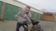 Moment police dog sinks teeth into snivelling robber after he attacked woman
