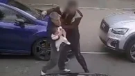 Horror moment dad carrying 3-month old baby girl is attacked in street