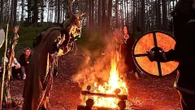 Moment cops raid BURIAL to rescue cult followers wrapped like mummies in graves