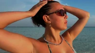 Millie Bobby Brown looks sensational in tiny bikini on the beach