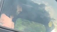 Moment Chelsea ace Marc Cucurella uses mobile while driving G-wagon
