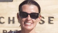 Coleen Rooney shows off incredible abs in sea with fellow WAG on family hol