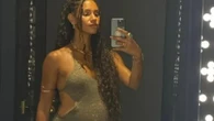 Pregnant Vick Hope shows off bump in mini dress at husband Calvin Harris' gig