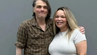 Noughties rock legend looks VERY different as he poses with Trisha Paytas