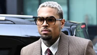 Chris Brown arrives at court after ‘hitting producer with bottle’ in club