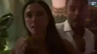 Victoria Beckham can't keep hands off hubby David in restaurant dance on his 50th