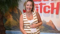 Tom Parker's widow beams as she holds growing baby bump on family day out