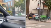 Shock moment brawl breaks out in posh London street as driver RUNS over man