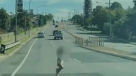 Heart-stopping moment nappy-wearing toddler dashes into dual carriageway