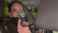 Terrifying moment raging Uber driver pulls GUN on female passenger