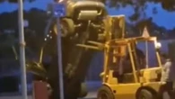 Moment forklift driver goes on rampage by flipping & smashing cars to bits