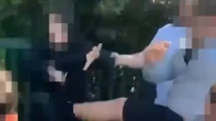 Horrific moment man holds schoolboy’s jumper while children beat him up