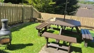 I added privacy to my fence with a £10 B&M buy - it brings tropical vibes too