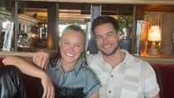 JoJo Siwa is returning to UK to be with Chris Hughes as they're seen kissing
