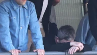Noel Gallagher looks miserable as he watches Man City lose with his daughter