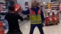 Moment Tesco shopper lobs crates of beer at security guard’s FACE
