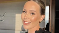 Proud stepmum Kate Ferdinand shares rare family snap as stepson TOWERS over her