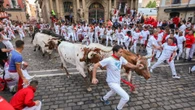 Man GORED by 1260lb beast at Pamplona bull run with eight others hurt in stampede