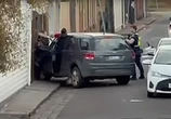 Horror moment cop is forced to shoot woman dead after being crushed by car