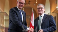 PM under fire after German chancellor slams Brexit — as Brussels demands cash
