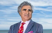 'Goldfinger' migrant hotel baron faces trial for 'defrauding £150k'