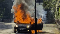 Moment car EXPLODES into 15ft fireball 'out of nowhere' in seaside hotspot