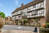 One of the UK's oldest inns with beer garden & 'dungeon' named best pub in England