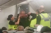 Shock moment ‘drunk’ passenger hauled off TUI flight after PUNCHING cabin crew
