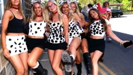 Boozy bank holiday revellers kick off three-day weekend with fancy dress pub crawl