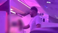 Moment Virgin Atlantic flyer hurls abuse at hostess he threatened to 'gang rape'