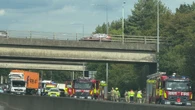 Major motorway closed due to car fire causing hour-long delays