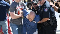 Identity of man arrested after Charlie Kirk murder in viral vid revealed