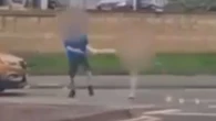 Moment NAKED man attacks driver at roundabout & attempts to get in car with kids
