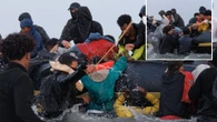 'Smuggler' herds migrants onto boat with a stick as they evade French cops AGAIN
