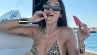 Dua Lipa shows off incredible figure in a tiny leopard print bikini