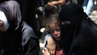 Israeli tanks 'open fire into Gaza crowd killing dozens' as IDF launches probe