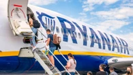 Fans shocked as rockstar worth £111m is seen queuing for Ryanair flight