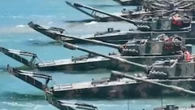 Watch as huge fleet of terrifying new Chinese ‘tank boats’ takes to water