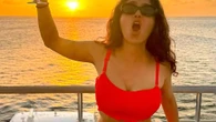 Salma Hayek, 59, looks incredible as she strips to red bikini on a yacht