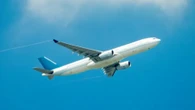 Footie fans while away half-time of 0-0 bore draw by PLANE SPOTTING