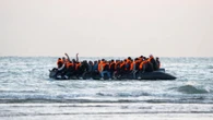 125 migrants arrive on SINGLE 'mega-dinghy' as PM brands Farage plan ‘racist’