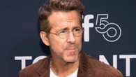 Watch moment Ryan Reynolds is 'rude' to kid on red carpet as fans rage