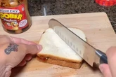 Dad is branded ‘unhinged’ over sandwich-making hack in ‘painful to watch’ video
