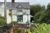 Home going to auction looks normal from outside – but it’s hiding horrid secret