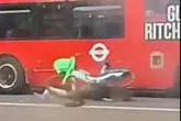 Moment cyclist smashes into bus & flips over handlebars - but who's to blame?