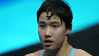 Swimming sensation, 12, becomes youngest ever to win medal at World Champs